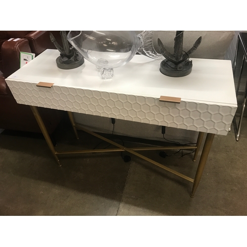 1388 - A white two drawer console table with gold legs