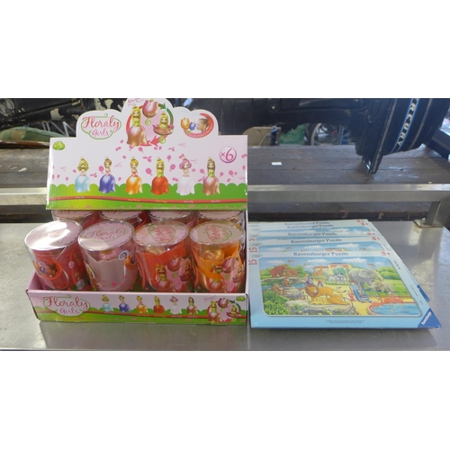 2092 - Bag of approx. 60 unused Ravensburger jigsaw puzzles and box of Floraly girl's dolls