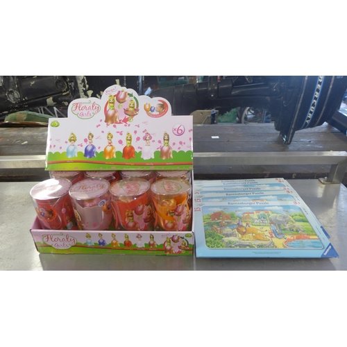 2092 - Bag of approx. 60 unused Ravensburger jigsaw puzzles and box of Floraly girl's dolls