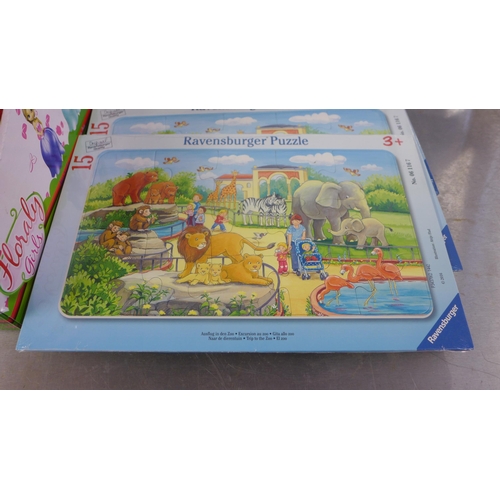 2092 - Bag of approx. 60 unused Ravensburger jigsaw puzzles and box of Floraly girl's dolls