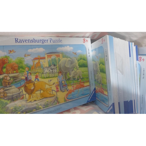 2092 - Bag of approx. 60 unused Ravensburger jigsaw puzzles and box of Floraly girl's dolls