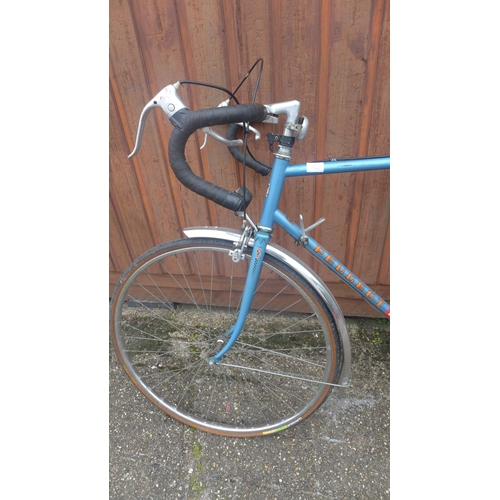 2135 - Peugeot 103 road bike with saddle bag and pump