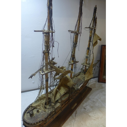 2195 - Model boat and framed sea scene