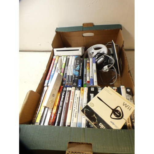 2211 - Wii console with a quantity of Playstation, Xbox and PC games, including Fifa, The Sims and Grand Th... 