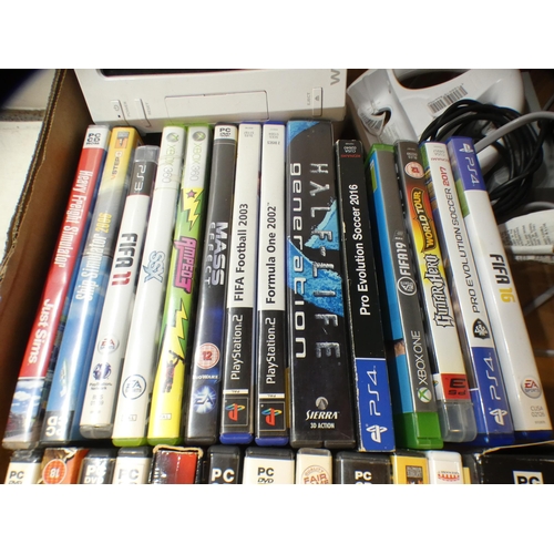 2211 - Wii console with a quantity of Playstation, Xbox and PC games, including Fifa, The Sims and Grand Th... 