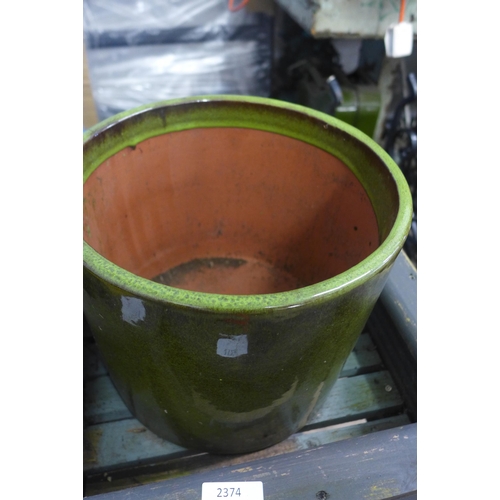 2374 - 2 Wood planters and 2 glazed plant pots