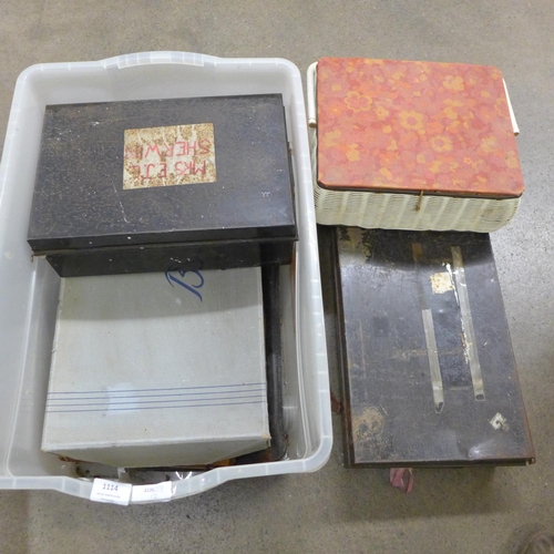 1114 - Two metal deed boxes, Lloyd Loom style sewing basket, two leather satchels/document holders and clot... 