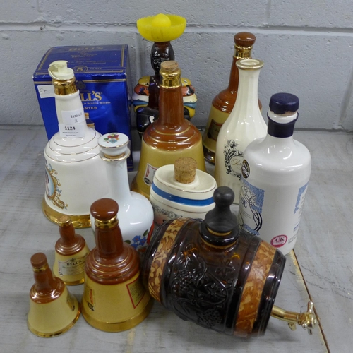 1124 - A collection of Wade whisky decanters and other decanters  **PLEASE NOTE THIS LOT IS NOT ELIGIBLE FO... 