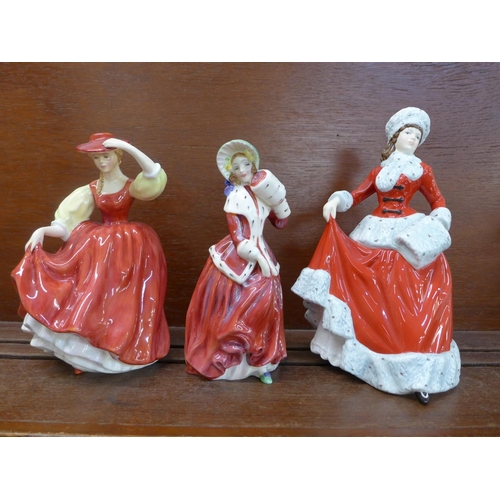 603 - Three Royal Doulton figures, Christmas Morn, Winter and Buttercup