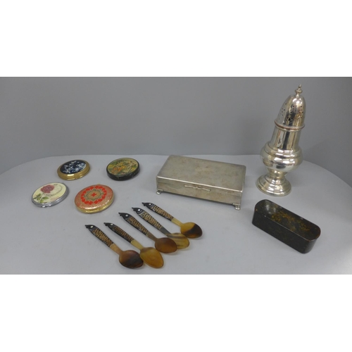 636 - A silver plated cigarette box, compacts, sugar shaker, bone spoons, etc.