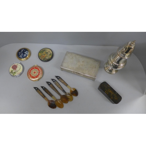 636 - A silver plated cigarette box, compacts, sugar shaker, bone spoons, etc.