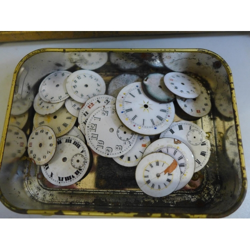 659 - A tin of early 20th Century trench watch movements