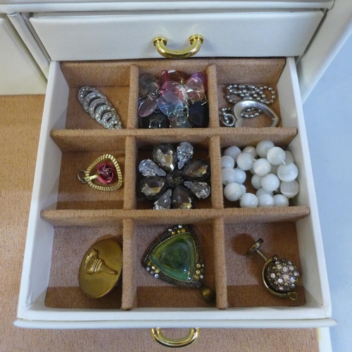 669 - A jewellery box with costume jewellery and wristwatches