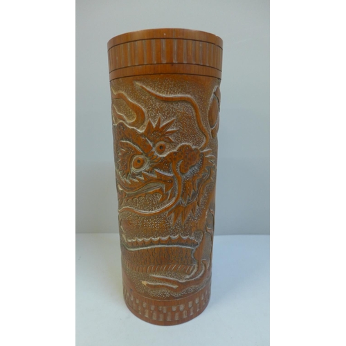 672 - An oriental bamboo brush pot, 26cm