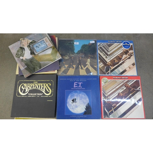 681 - Twenty vinyl LP records and four 7