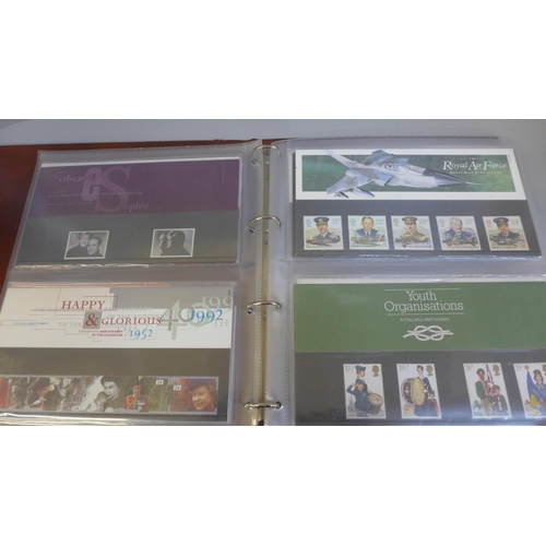 688 - Stamps; GB presentation packs in album, 43 no. packs with a face value of over £90