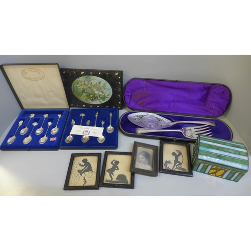 690 - A cased fish serving set, two sets of commemorative spoons, etc.