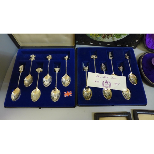 690 - A cased fish serving set, two sets of commemorative spoons, etc.