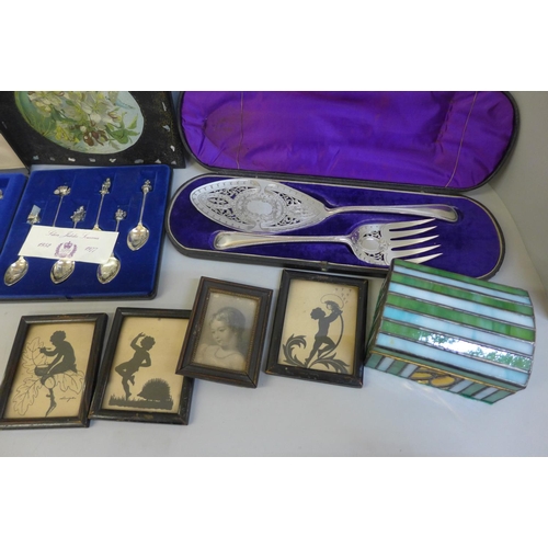 690 - A cased fish serving set, two sets of commemorative spoons, etc.