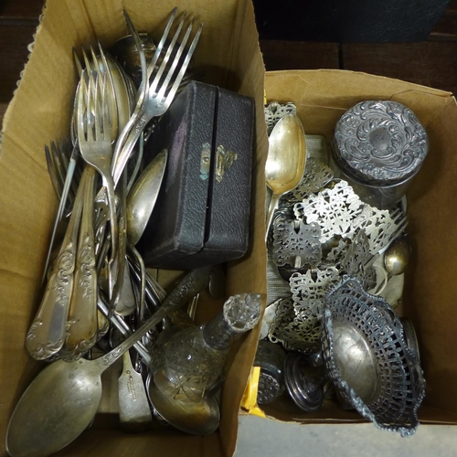 693 - A collection of flatware, a plated belt, grape scissors, (grape scissors broken) and assorted silver... 