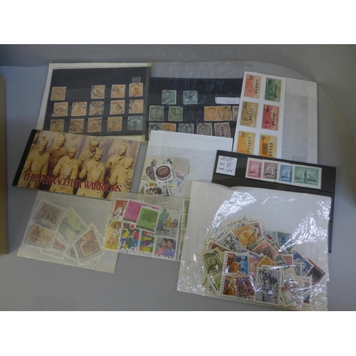 699 - Stamps; a box of China stamps, covers, etc.