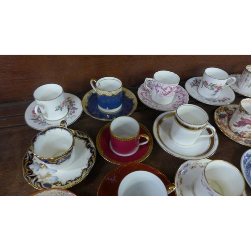 705 - A collection of twenty early to mid 20th Century coffee cans and saucers, includes Maling, Wedgwood,... 