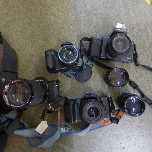 710 - Three 35mm film cameras, Olympus, Pentax, Yashica and a digital camera and lenses