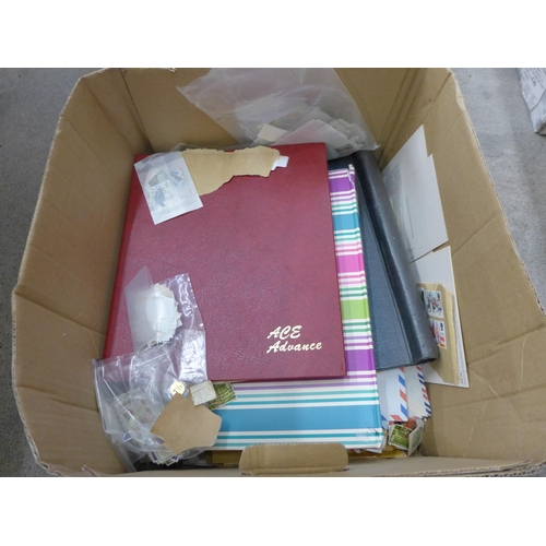 721 - Stamps; a box of stamps, covers, etc. - loose and in albums