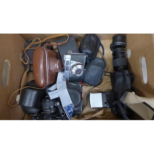 756 - A box of vintage cameras and lenses including Minolta, Praktica and Russian