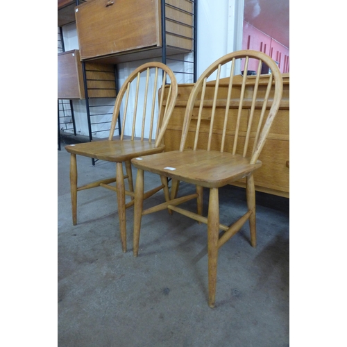 10 - A pair of Ercol Blonde elm and beech Windsor chairs