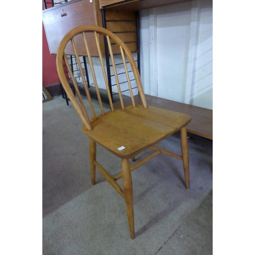 10 - A pair of Ercol Blonde elm and beech Windsor chairs