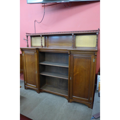 103 - A Victorian Aesthetic Movement walnut breakfront bookcase