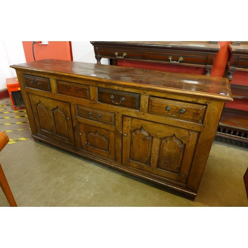 107 - A George II style oak dresser