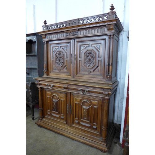 109 - A 19th Century French Henry II style carved walnut side cabinet