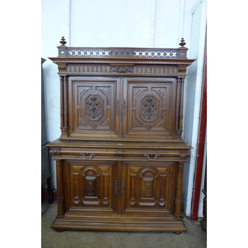 109 - A 19th Century French Henry II style carved walnut side cabinet