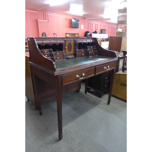 113 - An inlaid mahogany Carlton House style desk