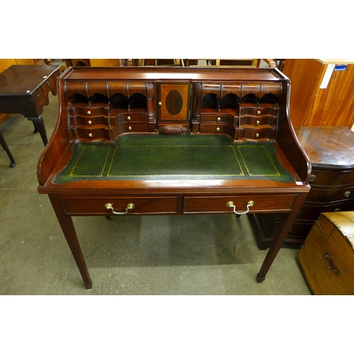 113 - An inlaid mahogany Carlton House style desk