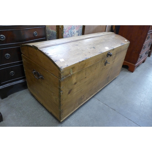 115 - A Victorian pine domed top blanket box