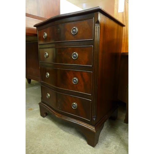 117 - A small mahogany serpentine chest of drawers