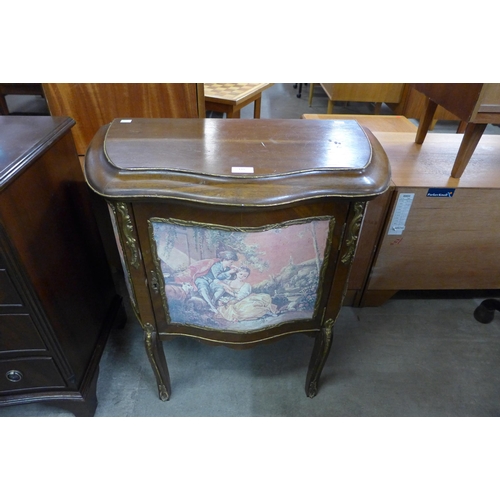 118 - A French Louis XV style mahogany and gilt metal mounted petit commode, with decorative Watteauesque ... 