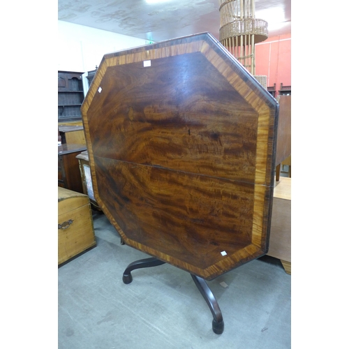 119 - A George IV mahogany octagonal tilt centre table