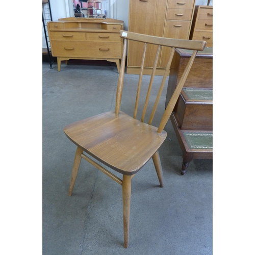 13 - A set of six Ercol Blonde elm and beech 391 model dining chairs