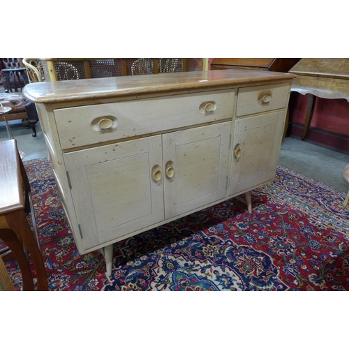 14 - An Ercol Blonde elma and beech Windsor sideboard