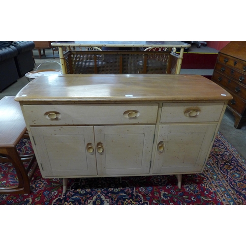 14 - An Ercol Blonde elma and beech Windsor sideboard