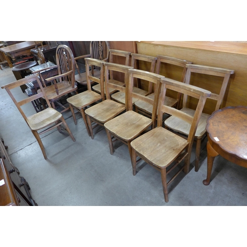 141 - A set of nine early 20th Century beech chapel chairs