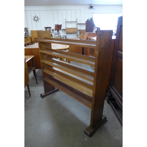 177 - A Gothic Revival carved oak open bookcase