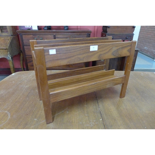 18 - A teak magazine rack