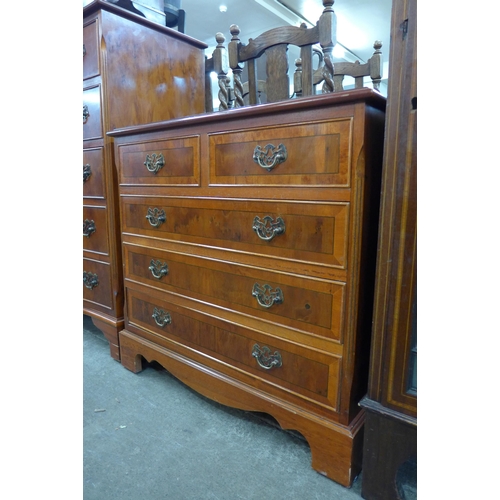 185 - A yew wood chest of drawers