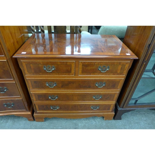 185 - A yew wood chest of drawers