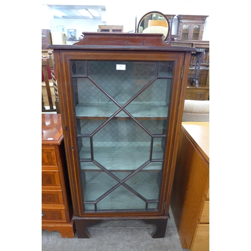 187 - An Edward VII inlaid single door bookcase